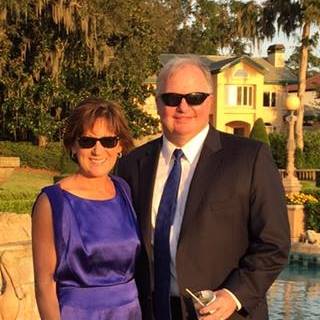 Mark and Robyn Sieron pose for an outdoor photo. 