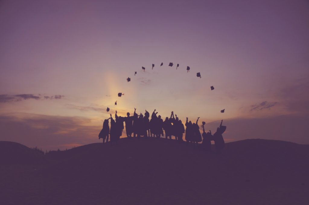 graduates-throwing-caps