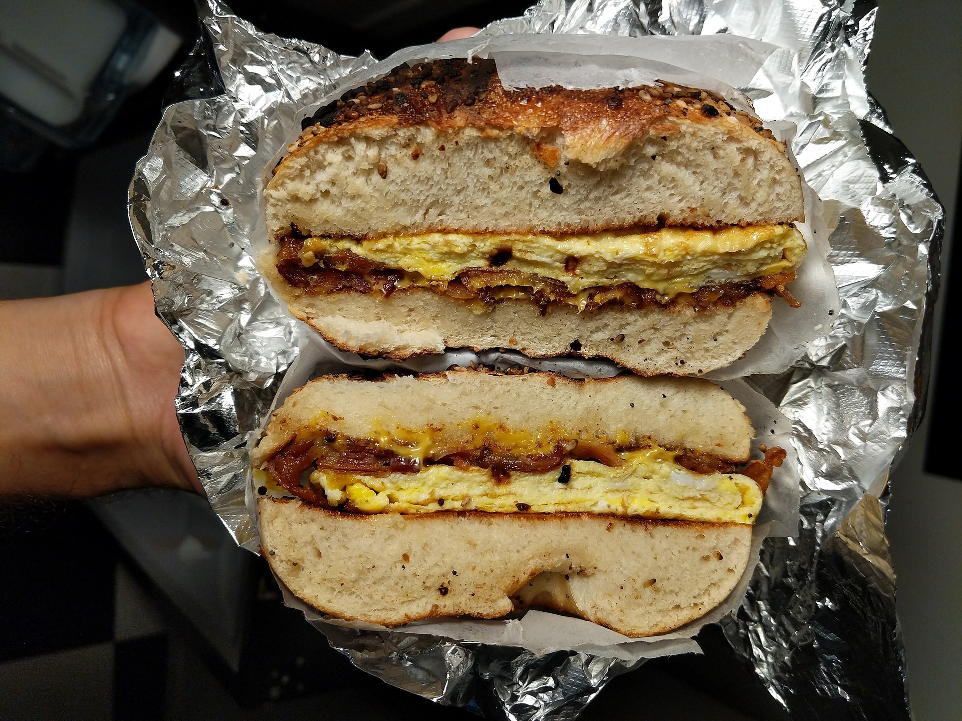 bacon egg and cheese on an everything bagel