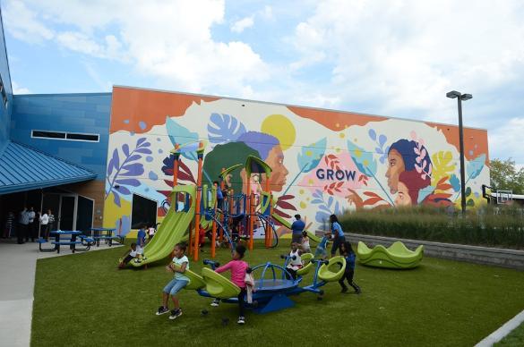 Children play at the Burt club playground