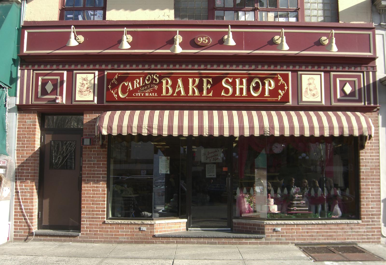 Carlos bake shop awning red and white