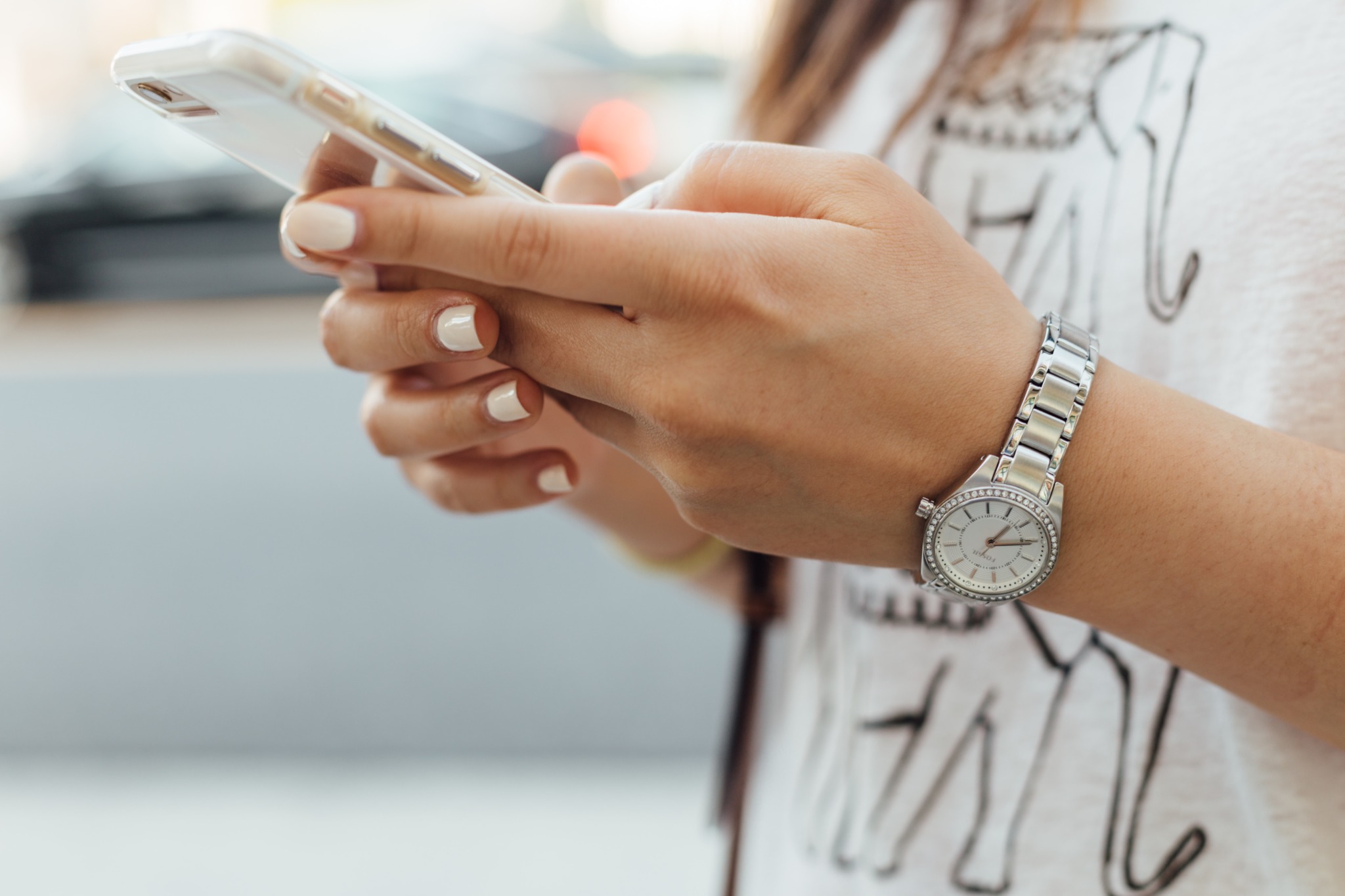 Girl texting on iPhone