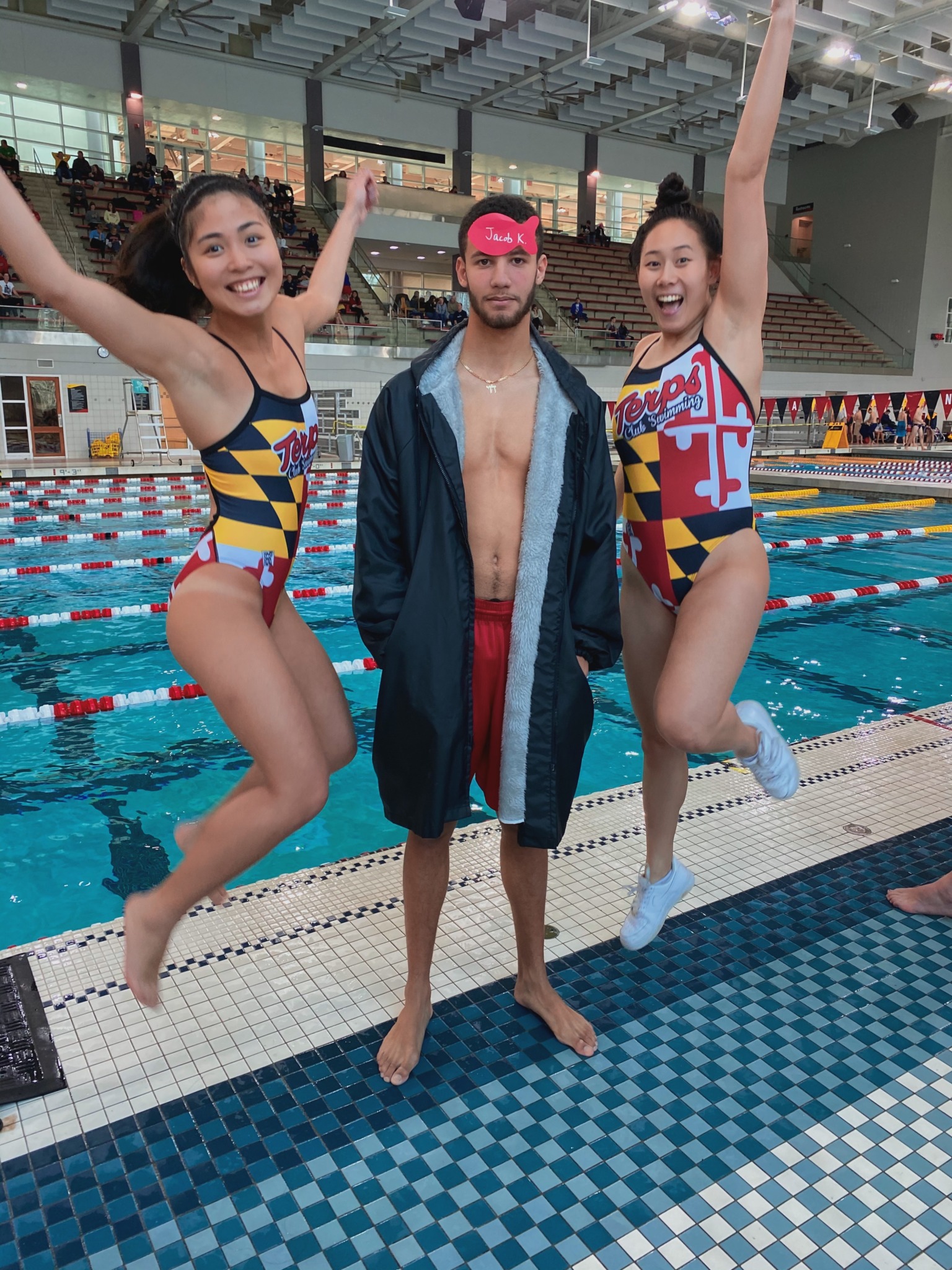 UMD club swimmers at a home meet