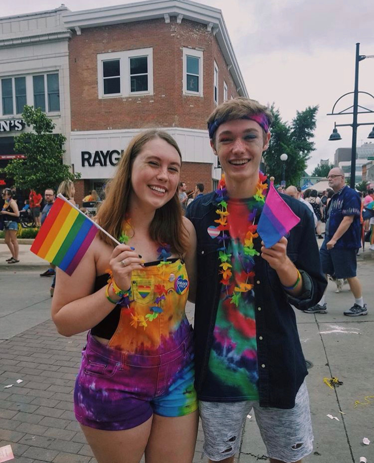 People pose together at Pride. 