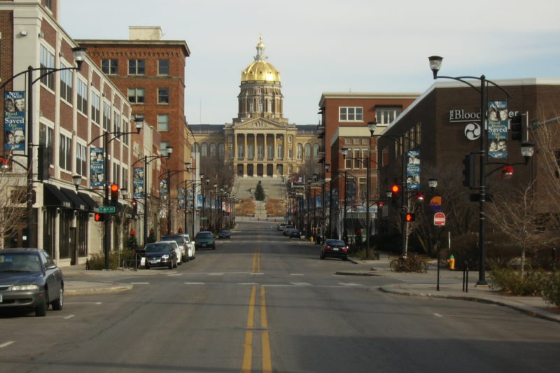 Shops line the road through the East Village leading to the Iowa Capitol