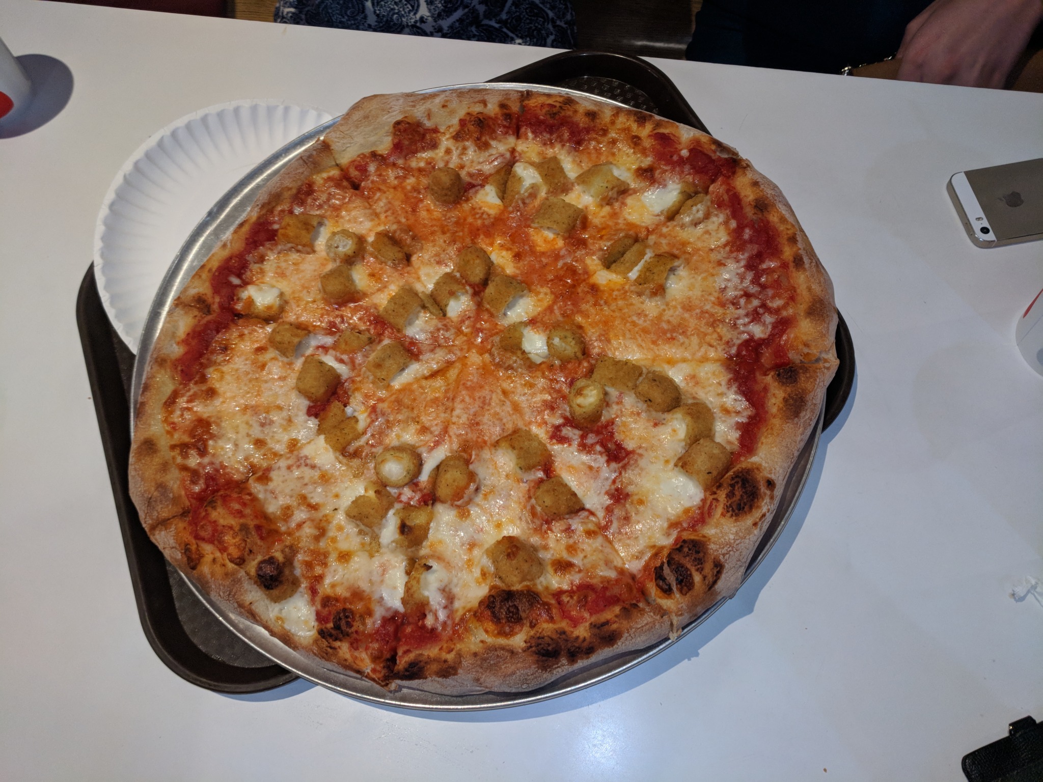 photo of the mozzarella stick pizza from T. Anthony