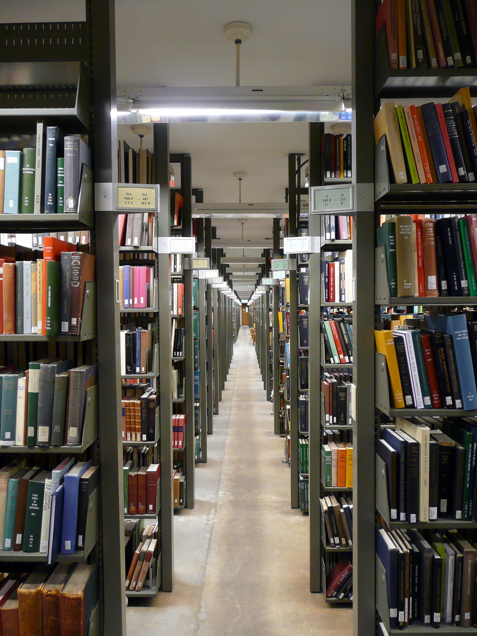 rows of books at Mugar Memorial Library