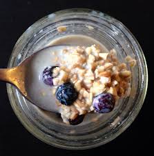 Spoon with oats and fruit
