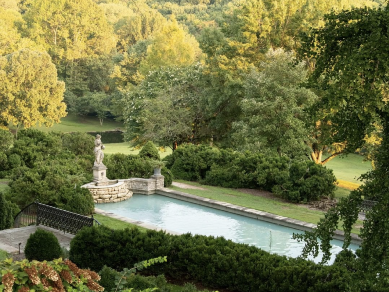 a fountain in a garden