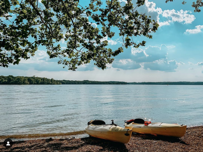 two kayaks sitting on the shore of Percy Priest Lake