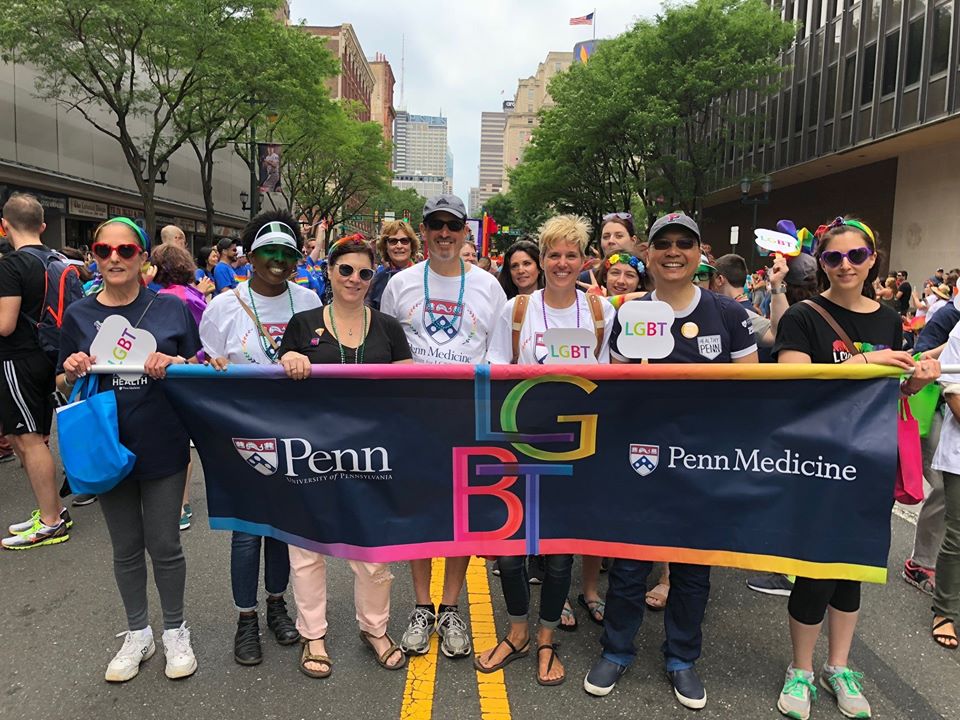 Members of the Penn LGBT Center march in a Pride parade