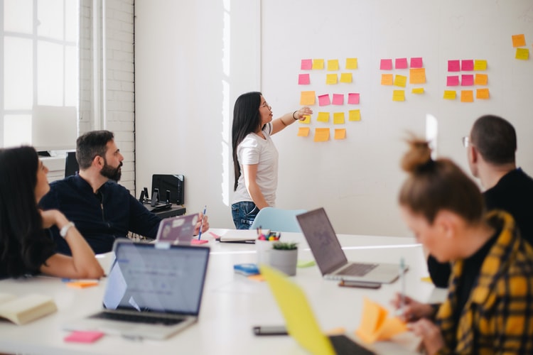 Woman leading a business meeting