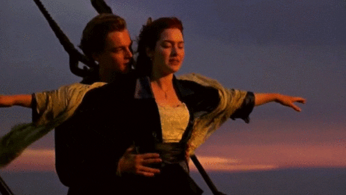 rose and jack doing king of the world on the titanic