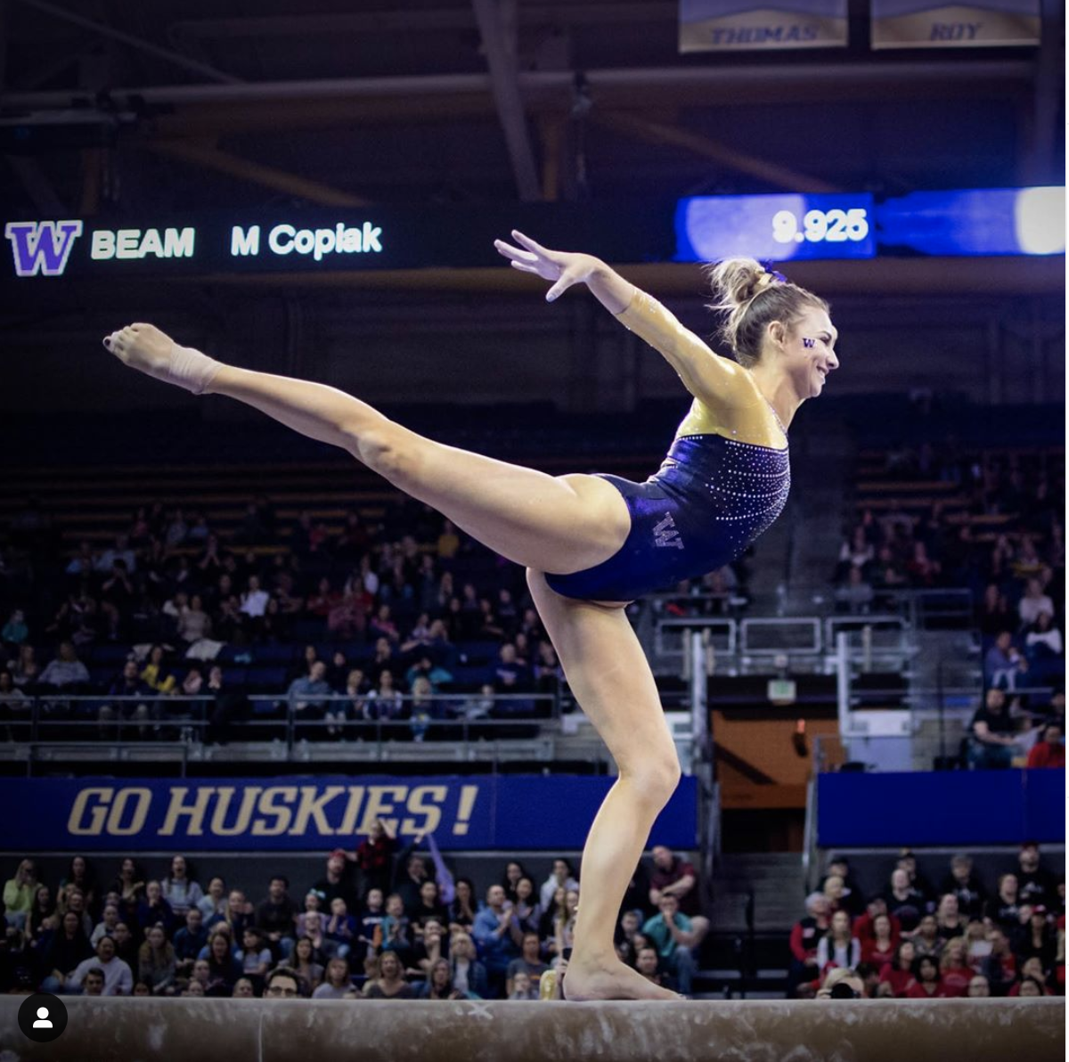 a gymnast on a balance beam