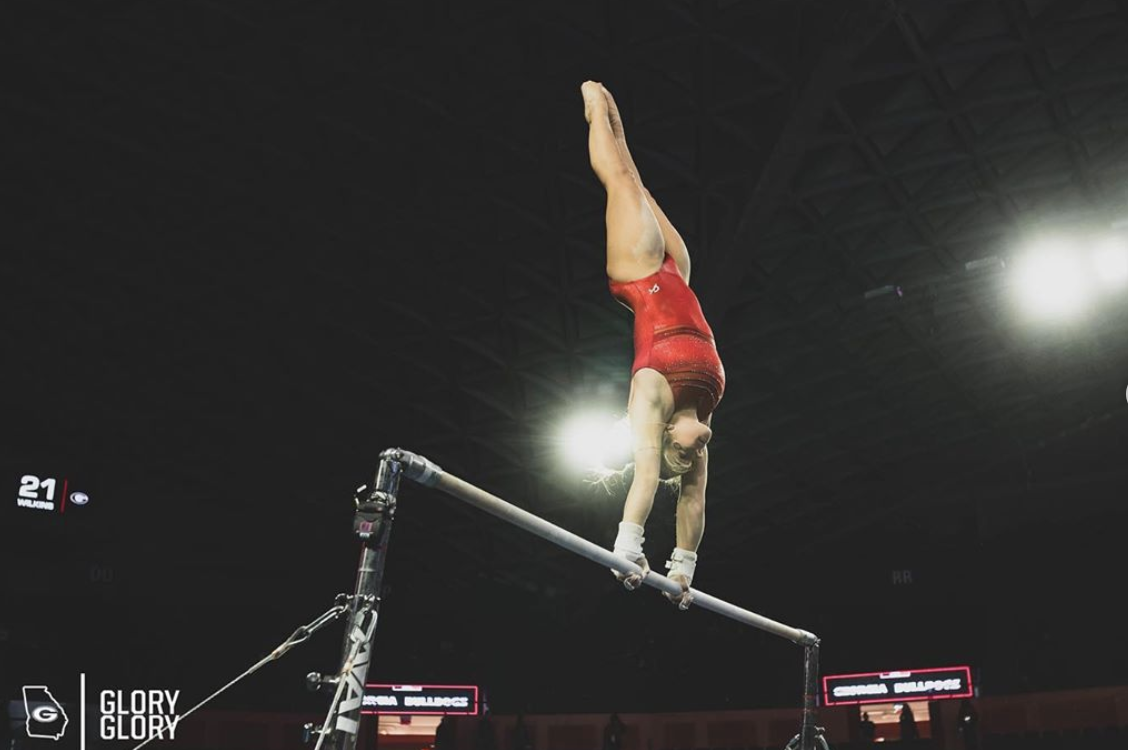 a gymnast on the uneven bars