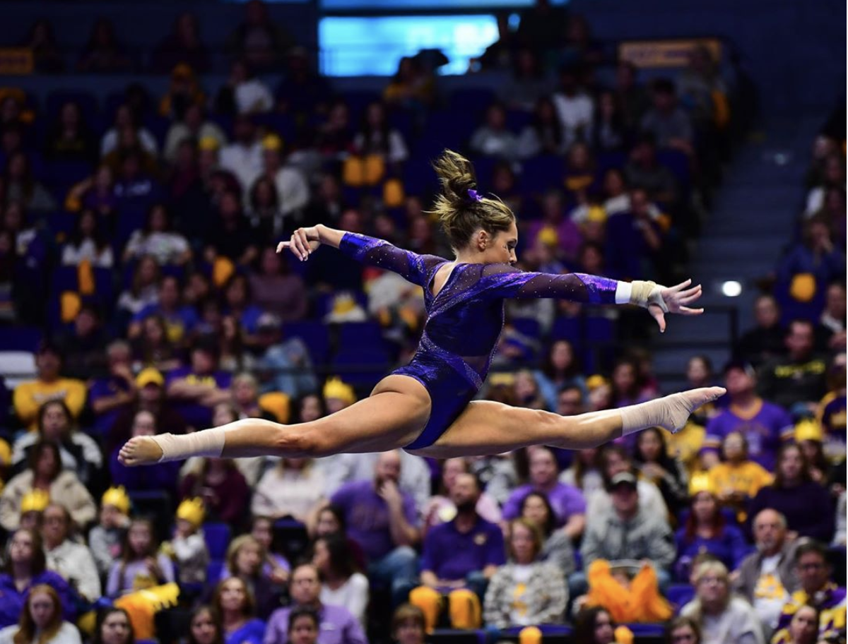 a gymnast doing a split in the air