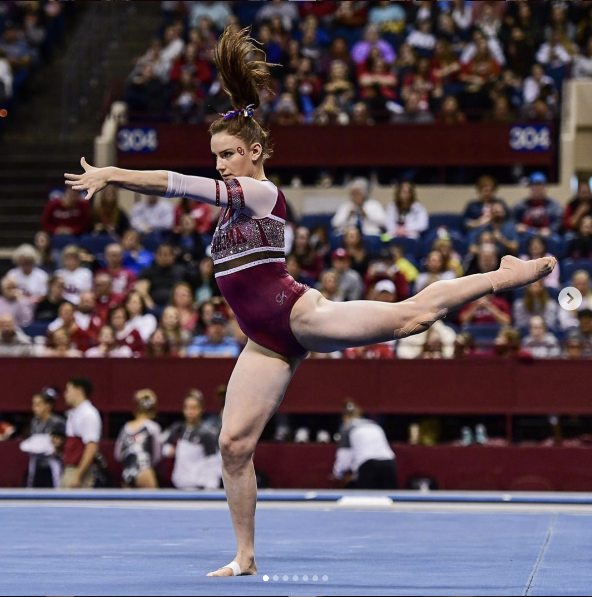 a gymnast dancing on the floor