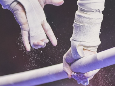 hands on the uneven bars