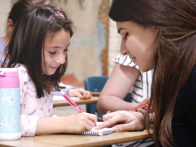 Irene teaching Noushig in Class