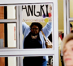 girl standing with angry sign
