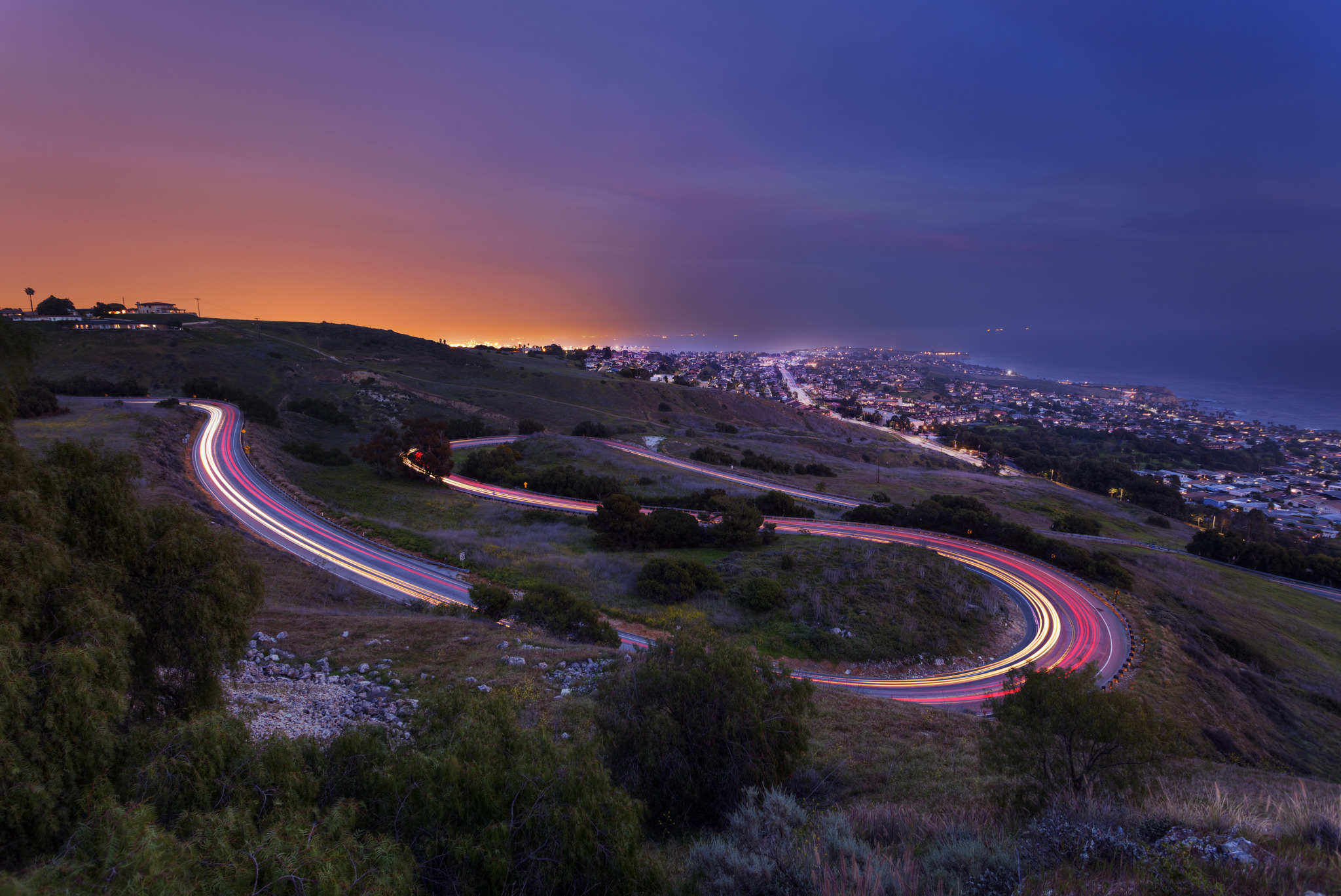 aerial photo of Palos Verdes drive overlooking the coastal town and the coast