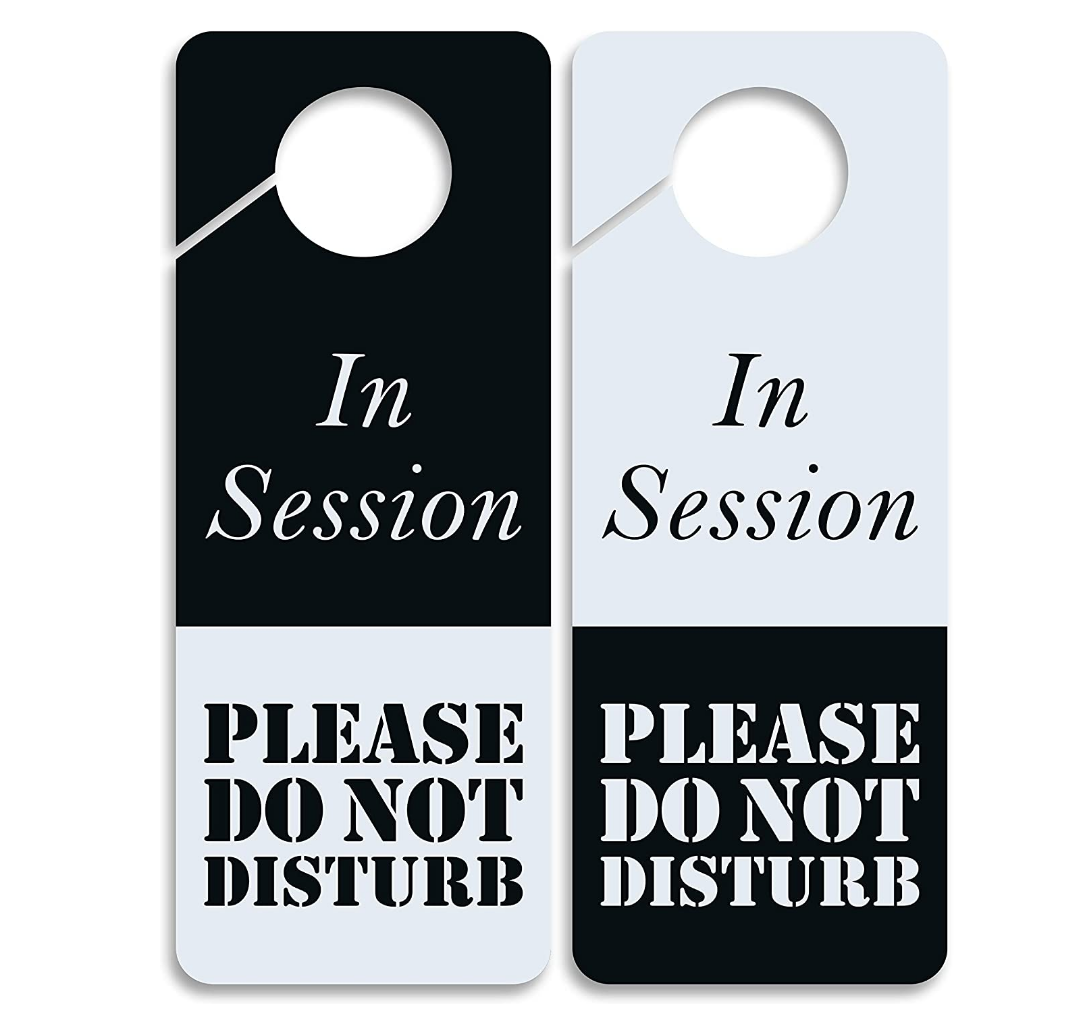 two versions of black and white do not disturb door hangers 