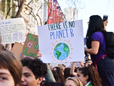 climate change protest. man holding a sign