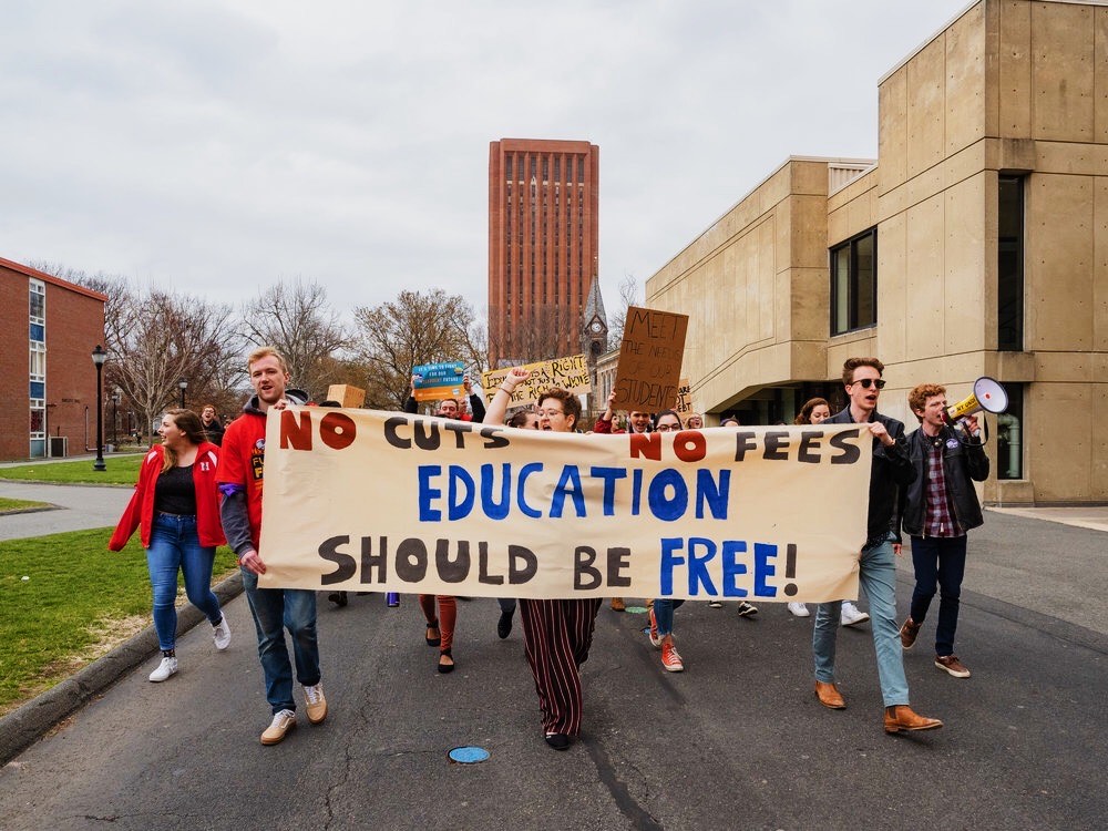 UMass President with Sign