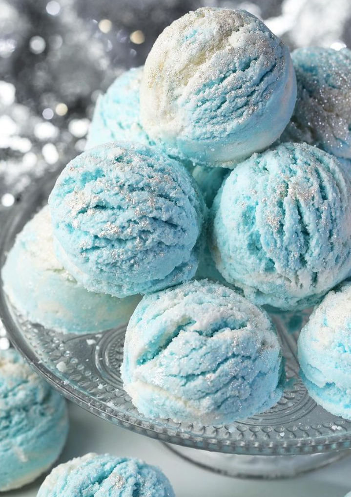 Blue bath bombs lie stacked together as an example of DIY gifts.