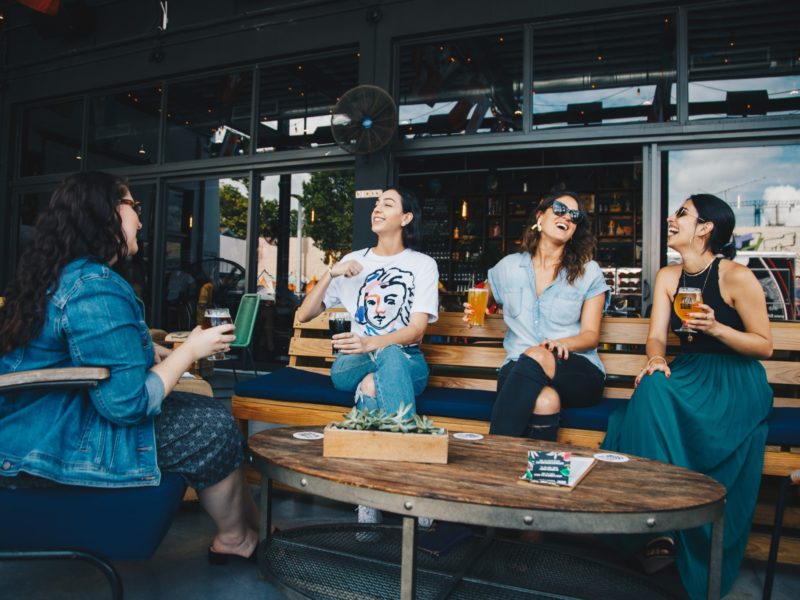 women talking outside