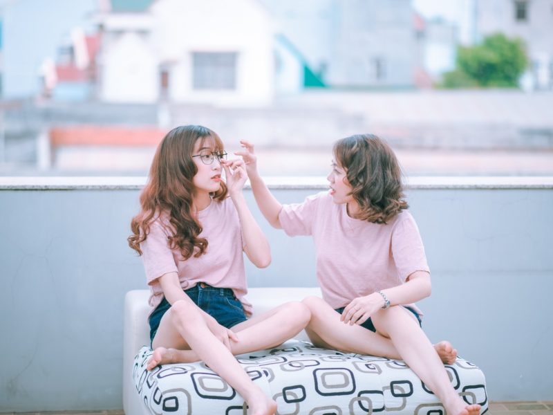 two girls sitting