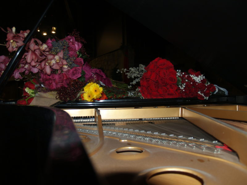 Grand piano with flowers