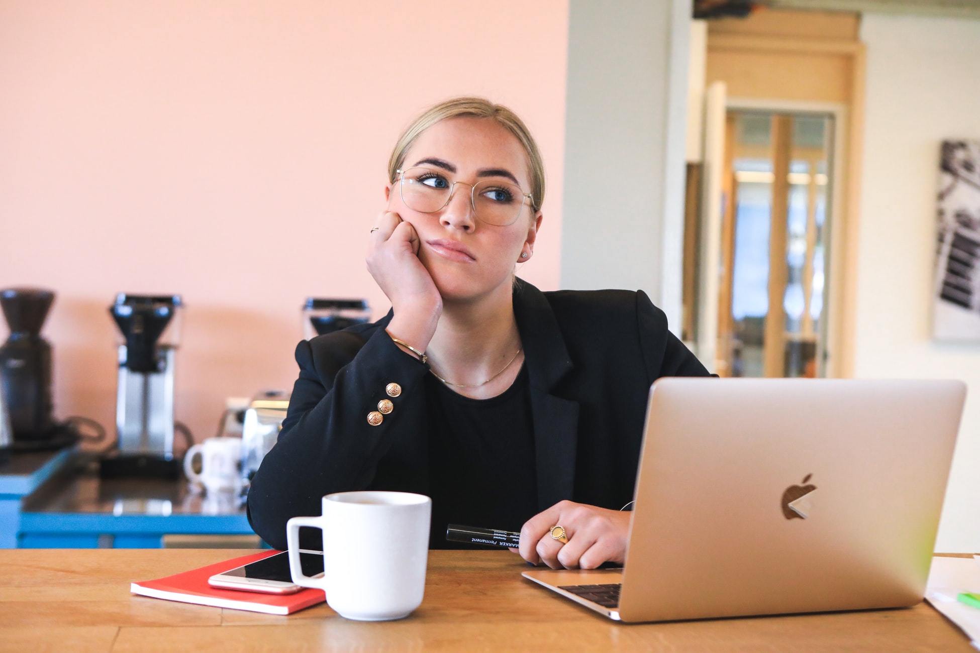 girl on computer looking bored