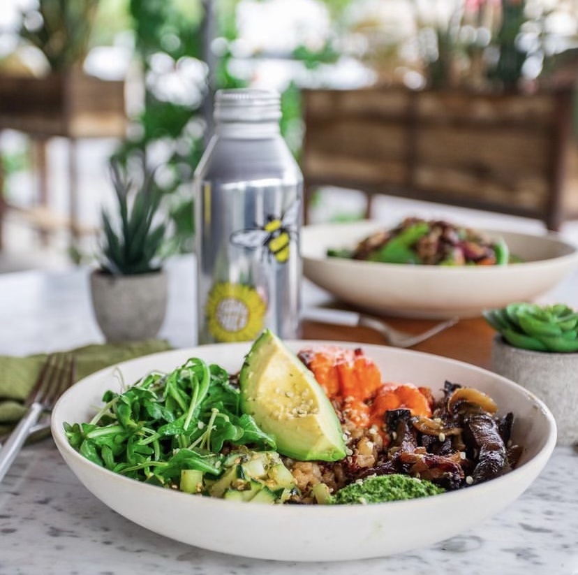 Flower Child's Mother Earth Bowl which includes ingredients such as ancient grains, sweet potato, portobello mushroom, avocado, cucumber and broccoli pesto