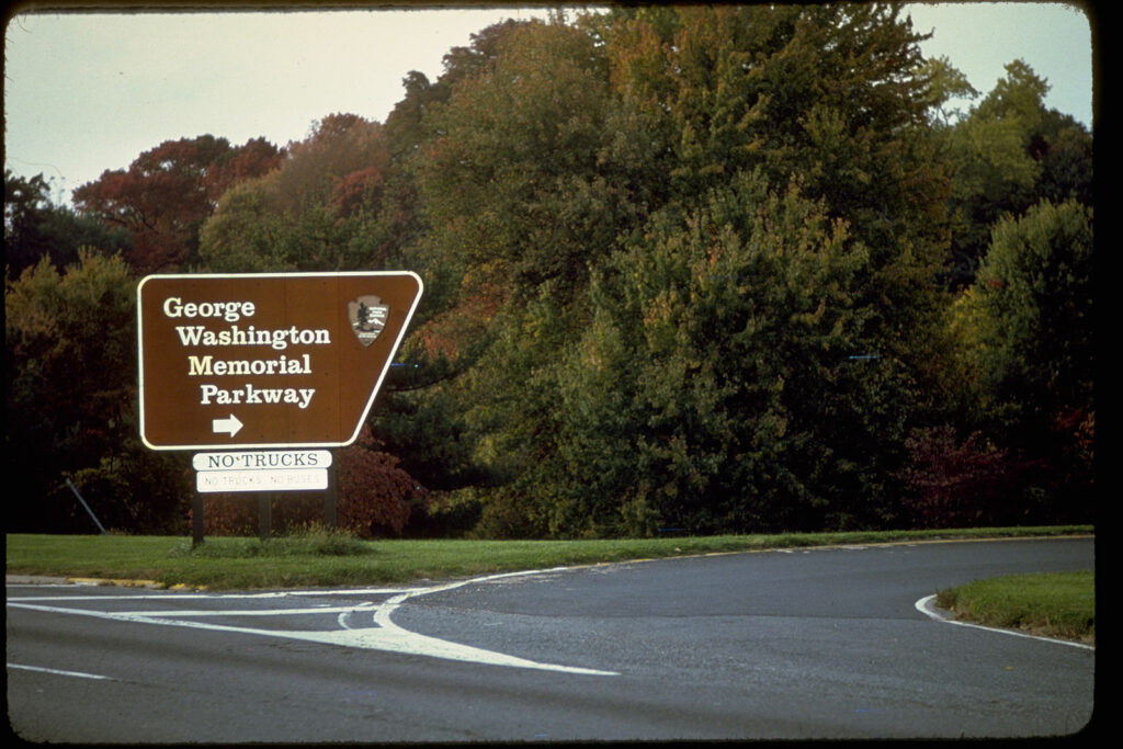 Road sign pointing off to the George Washington Memorial Parkway freeway exit