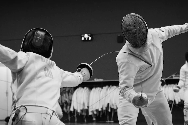 Two Beginner Fencers Potentially Failing