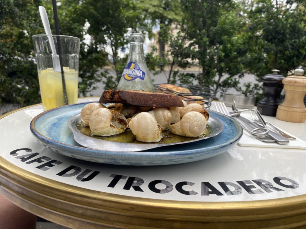 Photo of Escargots and the view from Cafe du Trocadero in Paris