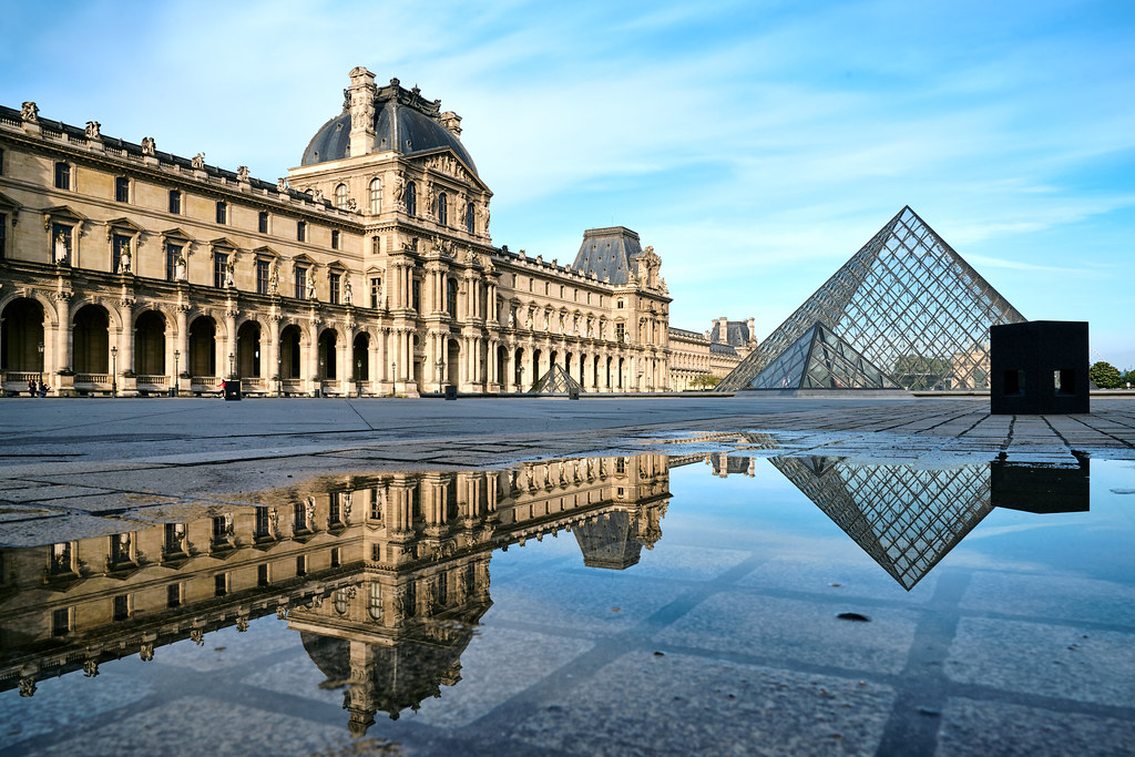 Photo of the outside of the louvre museum in Paris