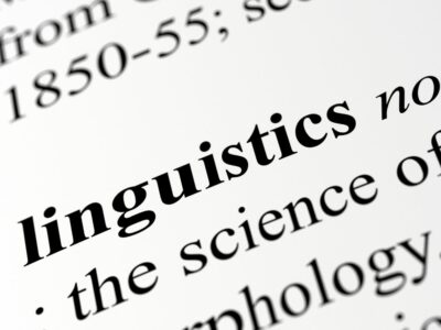 The word linguistics in bold on a piece of paper, with it's description following