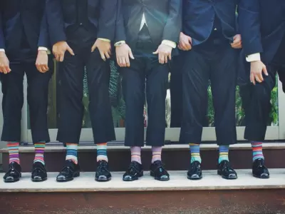 guys showing their cozy socks