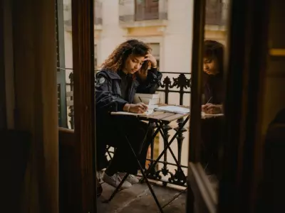Woman on Terrace Writing