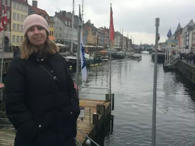 girl in front of docks